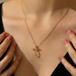 women wearing cross necklace